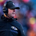 Baltimore Ravens head coach John Harbaugh walks the sideline in the fourth quarter of the NFL football game between Baltimore Ravens and Cincinnati Bengals at Paycor Stadium in Cincinnati on Dec. 14, 2025.