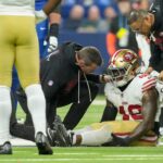 San Francisco 49ers linebacker Tatum Bethune (48) is checked on as he sits on the field Monday, Dec. 22, 2025, during a game against the Indianapolis Colts at Lucas Oil Stadium in Indianapolis.