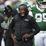 Dec 28, 2025; East Rutherford, New Jersey, USA; New York Jets head coach Aaron Glenn reacts during the first quarter of the game against the New England Patriots at MetLife Stadium. Mandatory Credit: Vincent Carchietta-Imagn Images