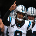 Jan 3, 2026; Tampa, Florida, USA; Carolina Panthers quarterback Bryce Young (9) runs on field before the game against the Tampa Bay Buccaneers at Raymond James Stadium. Mandatory Credit: Nathan Ray Seebeck-Imagn Images