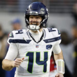 Jan 3, 2026; Santa Clara, California, USA; Seattle Seahawks quarterback Sam Darnold (14) reacts during the first half at Levi's Stadium. Mandatory Credit: Sergio Estrada-Imagn Images