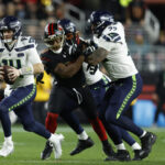 Onde assistir NFL Jan 3, 2026; Santa Clara, California, USA; Seattle Seahawks quarterback Sam Darnold (14) rushes the ball against the San Francisco 49ers during the first half at Levi's Stadium. Mandatory Credit: Sergio Estrada-Imagn Images