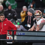 Jan 11, 2026; Philadelphia, PA, USA; San Francisco 49ers tight end George Kittle (85) is carted off the field after an injury during the second quarter against the Philadelphia Eagles in an NFC Wild Card Round game at Lincoln Financial Field. Mandatory Credit: Bill Streicher-Imagn Images