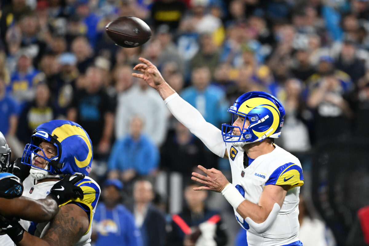 Jan 10, 2026; Charlotte, NC, USA; Los Angeles Rams quarterback Matthew Stafford (9) passes the ball in the fourth quarter in an NFC Wild Card Round game at Bank of America Stadium. Mandatory Credit: Bob Donnan-Imagn Images