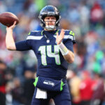 Jan 17, 2026; Seattle, WA, USA; Seattle Seahawks quarterback Sam Darnold (14) warms up prior to a game against the San Francisco 49ers in an NFC Divisional Round game at Lumen Field. Mandatory Credit: Kevin Ng-Imagn Images