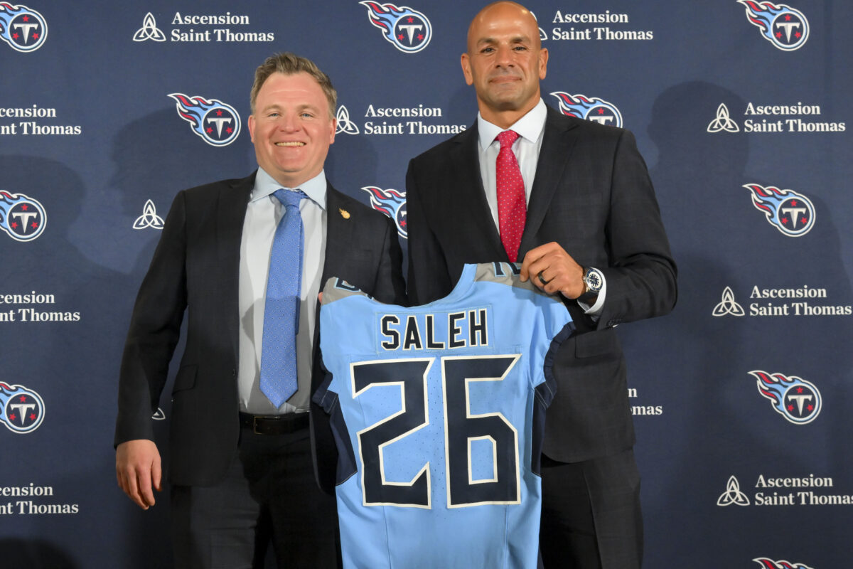 Jan 29, 2026; Nashville, TN, USA; Tennessee Titans general manager Mike Borgonzi and Tennessee Titans head coach Robert Saleh holds up the Titans jersey during the press conference at Ascension Saint Thomas Sports Park. Mandatory Credit: Steve Roberts-Imagn Images