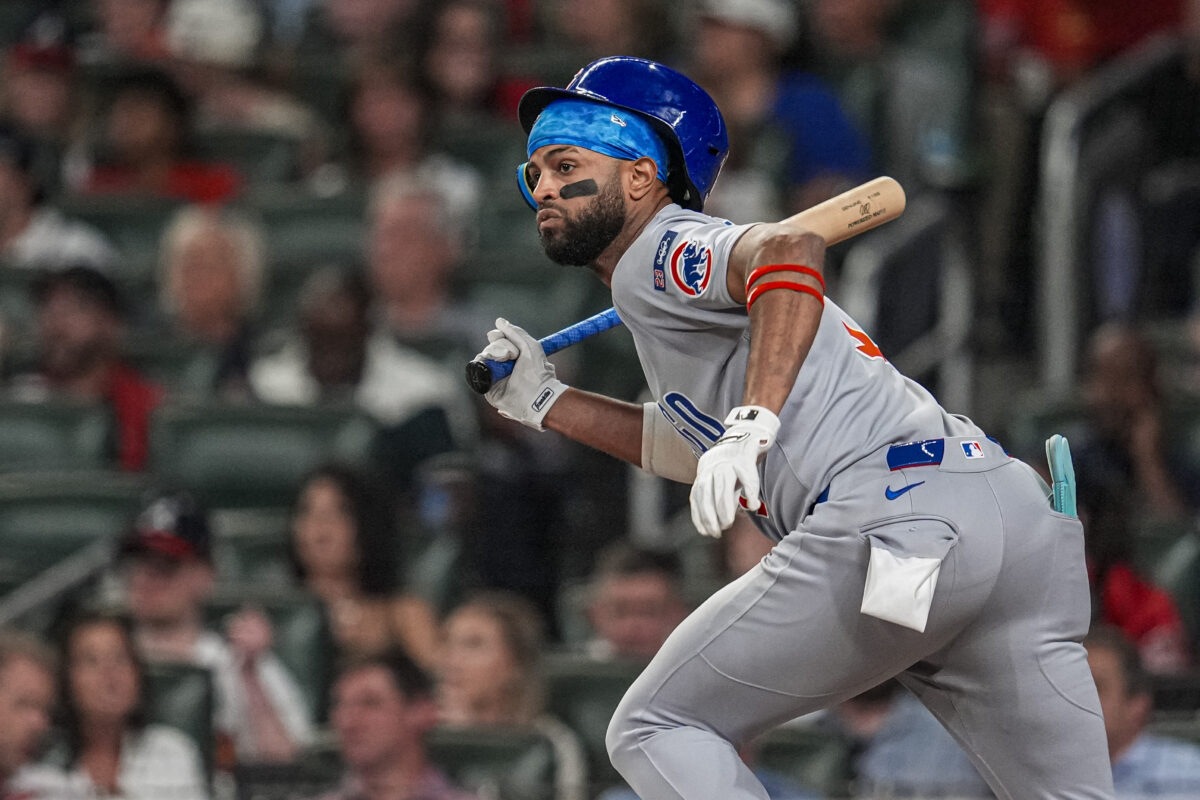 Sep 10, 2025; Cumberland, Georgia, USA; Chicago Cubs third baseman Willi Castro (1) singles against the Atlanta Braves during the sixth inning at Truist Park.