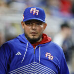 Mar 17, 2023; Miami, Florida, USA; Puerto Rico manager Yadier Molina looks on prior to the game against Mexico at LoanDepot Park.