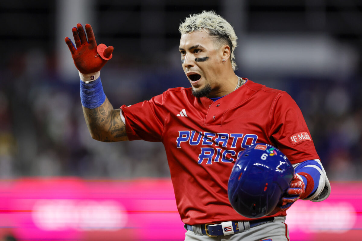 Porto Rico Mar 17, 2023; Miami, Florida, USA; Puerto Rico second baseman Javier Baez (9) celebrates after a base hit during the eighth inning against Mexico at LoanDepot Park. Mandatory Credit: Sam Navarro-USA TODAY Sports