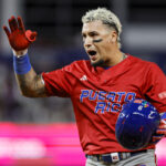 Porto Rico Mar 17, 2023; Miami, Florida, USA; Puerto Rico second baseman Javier Baez (9) celebrates after a base hit during the eighth inning against Mexico at LoanDepot Park. Mandatory Credit: Sam Navarro-USA TODAY Sports