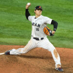 Mar 21, 2023; Miami, Florida, USA; Japan relief pitcher Shohei Ohtani (16) delivers a pitch during the ninth inning against the USA at LoanDepot Park. Mandatory Credit: Sam Navarro-USA TODAY Sports