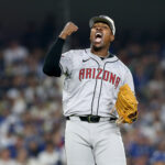 Brasil WBC Jul 4, 2024; Los Angeles, California, USA; Arizona Diamondbacks pitcher Thyago Vieira (49) reacts after a strikeout to end the game against the Los Angeles Dodgers at Dodger Stadium. Mandatory Credit: Jason Parkhurst-USA TODAY Sports