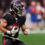 Jan 4, 2026; Atlanta, Georgia, USA; Atlanta Falcons running back Bijan Robinson (7) runs the ball against the New Orleans Saints in the third quarter at Mercedes-Benz Stadium. Mandatory Credit: Brett Davis-Imagn Images