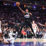 Feb 4, 2026; New York, New York, USA; Denver Nuggets guard Peyton Watson (8) drives past New York Knicks guard Jalen Brunson (11) and Ariel Hukporti (55) in the second quarter at Madison Square Garden. Mandatory Credit: Wendell Cruz-Imagn Images